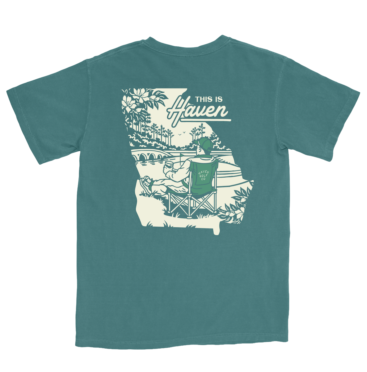 Teal t-shirt with 'This is Haven' graphic on a white background