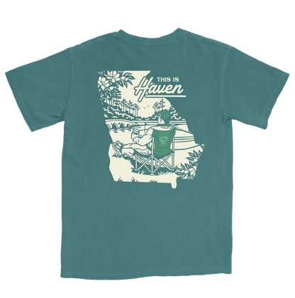 Teal t-shirt with 'This is Haven' graphic on a white background